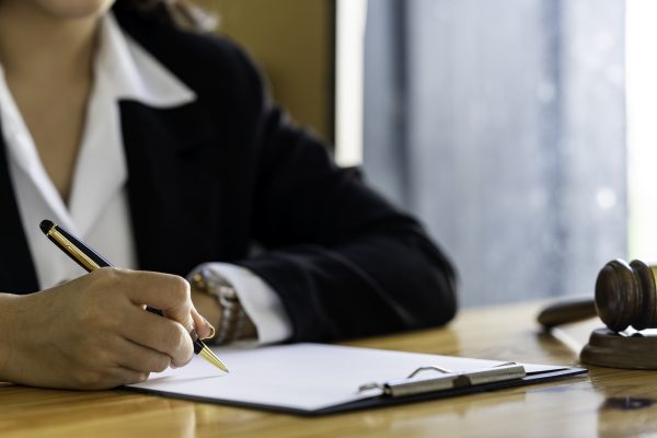 Lawyer business women working and notary signs the documents at office. consultant lawyer, justice a